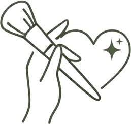 Brocha de maquillaje y corazón